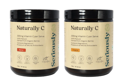 Two containers of 'Naturally C' supplement by 'Seriously' on a white background