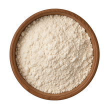 Organic whey protein powder in round timber bowl – high-protein, grass-fed New Zealand dairy supplement for shakes, smoothies and healthy recipes.
